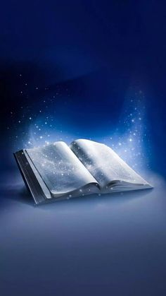 an open book on a blue background with stars and light coming out of the pages