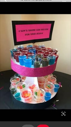 an image of a table with cups on it and a sign that says i don't