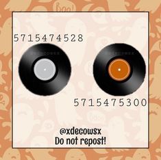 two black records sitting on top of each other in front of an orange and white background