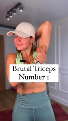 a woman in tight pants and a baseball cap with the words brutal tricks number 1