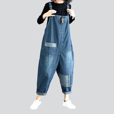 Make a statement this season with our new-millennium-style 2023 Autumn Collection Patchwork Denim Jumpsuit! Boasting a loose fit. patchwork-style design. and suspenders closure. this one-of-a-kind piece is perfect for those who want to stay ahead of the trend.Distinctive Features: Y2K Style: Take a trip back in time with our vintage-inspired Y2k-style denim jumpsuit! Patchwork Design: Our denim jumpsuit features patchwork-style patches on the legs for a unique. edgy look. Baggy Fit: Our jumpsuit Denim Blue Bib Front Jumpsuit And Rompers, Casual Baggy Patchwork Overalls, Casual Denim Patchwork Overalls Jumpsuit, Casual Blue Denim Jumpsuit With Patchwork, Casual Denim Overalls With Patchwork, Summer Denim Patchwork Jumpsuit, Fall Denim Jumpsuit With Bib Front, Fall Bib Front Denim Jumpsuit, Denim Blue Patchwork Cotton Overalls