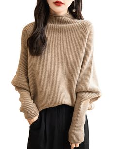 Features: Enhance your wardrobe with this stylish and comfortable Turtleneck Sweater for Women. Made with 100% Merino wool, this fall and winter essential provides warmth and timeless elegance. The long sleeves and vintage knit give a classic touch, perfect for any occasion. Complete your outfit with this high-quality, versatile piece.