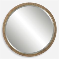 a round mirror with wood trim around it