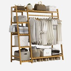 a wooden shelf with clothes and baskets on it