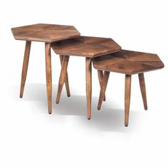 two wooden tables sitting next to each other