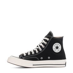 By 1970, the Chuck Taylor All Star evolved into one of the best basketball sneakers ever. The Converse Chuck 70 celebrates that heritage by combining archival-inspired details with modern comfort updates. Ortholite insole cushioning and winged tongue stitching take the comfort level up a notch. A glossy midsole and signature star ankle patch bring out the shoe's iconic, vintage style. Runs a half-size large. High-top shoe with canvas upper. Winged tongue stitching helps lock it in place. Vintage White Kicks, Converse Chuck 70, Wide Width Shoes, Chuck 70, Basketball Sneakers, Backpack Sport, Chuck Taylor All Star, Converse Chuck, Shoe Care