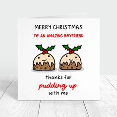 a christmas card with two puddings and holly on the top, says merry christmas to an amazing boyfriend thanks for puddinging up with me