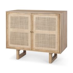 a wooden cabinet with rattan doors and legs