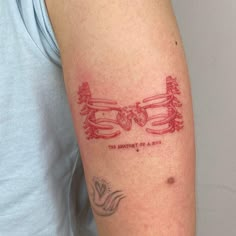 a person with a tattoo on their arm