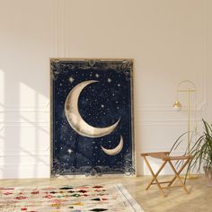 a room with a rug, chair and painting on the wall that has a crescent moon in it