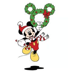 the mickey mouse character is holding a christmas wreath and waving it's arms in the air