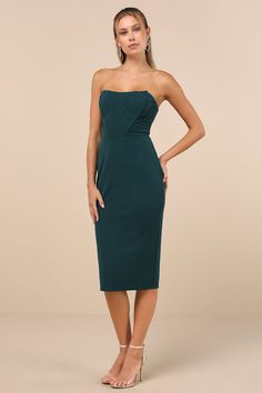 The Lulus Gorgeously Sultry Emerald Green Bustier Strapless Midi Dress will call in compliments the moment you slip it on! Stretchy crepe knit falls from a sweetheart-style neckline (with hidden no-slip strips) into a strapless, bustier-inspired bodice with raised seaming and supportive side boning. High, fitted waist sits atop a bodycon skirt that flaunts your curves perfectly before ending at a midi hem. Kick pleat at back for movement. Hidden back zipper/clasp. Fit: This garment runs small - Casual Formal Dresses, Strapless Bustier, Homecoming Outfits, Kick Pleat, Strapless Midi Dress, Casual Wedding Dress, Midi Cocktail Dress, Lulu Fashion, Body Con Skirt