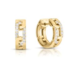 Inspired by the Navarra region of Spain, this Roberto Coin collection interprets those cross-cultural influences as classic yet modern jewelry, modeled after traditional links but styled for a new millennium. These Navarra hoop earrings are crafted in 18k yellow gold and feature a sparkling round diamond link. Roberto Coin signs each one of his pieces with a small ruby casted inside the jewel, in direct contact with the skin of who wears it. This magical signature, surrounded by an antique halo Gold Diamond Hoop Earrings, Diamond Huggie Earrings, Historical Jewellery, Coin Collection, Roberto Coin, Coin Jewelry, Diamond Hoop Earrings, Gold Hoop, Gold Earrings Studs