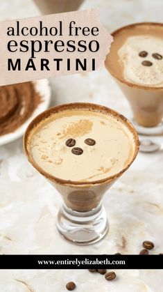 two glasses filled with liquid and topped with coffee beans