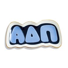 a blue and white plate with the word aan on it's bottom corner