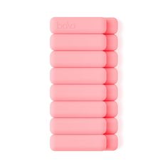 the pink foam rollers are lined up on top of each other, with the word bo