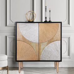 a white and gold sideboard in a room