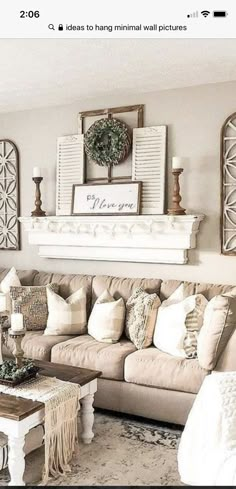 a living room filled with lots of furniture and decor on top of a wooden table