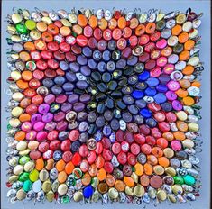 an art work made out of many different colored buttons