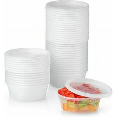 plastic cups with lids are stacked on top of each other