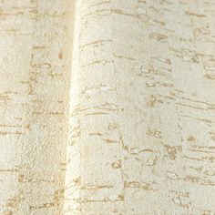 an open book with white pages and brown lines on the cover is shown in close up