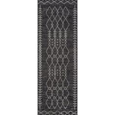 a black and white runner rug with an intricate design