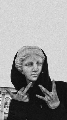 black and white photograph of a woman with hands in front of her face, wearing a nun outfit