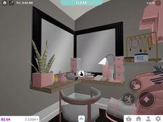 a virtual view of a bedroom with pink furniture and accessories on the desk, along with a large mirror