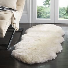 PRICES MAY VARY. [Perfect for any Room]: Available in sizes for any space, this rug is the pinnacle of luxurious style for rustic, boho, glam, farmhouse, contemporary, or transitional types of décor [Quality Product]: Genuine natural premium sheepskin pelt is undyed, unique, and unaltered from the slight variations that add organic qualities to your rug [Luxurious Pile]: Features a 3.4-inch comfortable and luxurious flowing pile thickness for cushioned fluffy softness underfoot Safavieh has been White Shag Rug, Fur Rug, Sheep Skin, Rustic Glam, Sheepskin Rug, Contemporary Interior Design, White Rug, White Area Rug, Handmade Home Decor