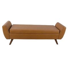 a brown leather bench sitting on top of a white floor