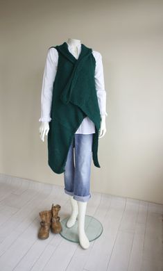 I knitted with love this Forest Green long vest. ( Belt is not included.) This beautiful Green Oversized Knit Vest is perfect for the changing weather, and will be fun to wear all season long. This Long Knit Top is cozy and stylish. It s very soft and warm. This Knitted Vest is easy to change around for many different looks and styles. One size fits all If you are interested in a particular color,let me know. Perfect for your self or as a gift for that special someone and Mother's day gift. This Oversized Knit Vest, Long Waistcoat, Vest For Women, Long Vest, Knitted Vest, Sweater Vest Women, Long Vests, Women Christmas, Long Knit