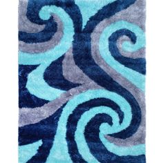 a blue and gray rug with swirls on it