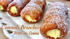 three creme filled pastries on a plate with the words connoli brioches