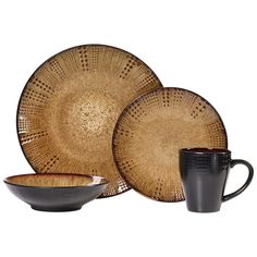 a black cup and some brown plates on a white background