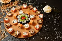 sushi platter with various types of sushi on it