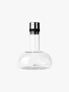 Glass bottle-shaped decanter.