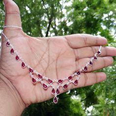 "Natural Cabochon Garnet 925 Sterling Silver Bezel Set Handmade Wedding Necklace. J70405  Main Color: Red  Size: Non Adjustable (18\" inch) Stone Size (can vary as per availability) : 5x8 Pear Weight:  12 gram  Item code: J70405  You can use it your self or Gift it to someone. It is an ideal gift which everyone would love to get. If you want extra small or extra large let me know. We will make it specially for you. Brought to you exclusively by Jewellery4All" Hand-set Ruby Necklaces In Silver, Formal Sterling Silver Necklaces With Stone Setting, Formal Sterling Silver Necklace With Stone Setting, Silver Drop Necklace With Hand Set Details, Sterling Silver Necklaces With Stone Setting For Wedding, Silver Teardrop Necklace With Hand-set Details, Silver Teardrop Necklace Hand Set, Silver Teardrop Necklace With Hand Set Stones, Silver Gemstone Bridal Necklace For Anniversary