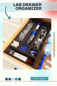 an open drawer with various items in it and the words lab drawer organizer on top