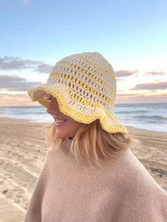 This crochet bucket hat is made by hand! The material is light and soft so perfect for a day at the beach, a fashion piece and even to keep you warm. Lightweight Crochet Hat For Warm Weather, Summer Lightweight Crochet Hat, Lightweight Summer Crochet Hat, Lightweight Summer Crochet Hat For Warm Weather, Cotton Sun Hat, Summer Crochet Hat For Vacation, Spring Crochet Yarn Beach Hat, Summer Crochet Hat One Size In Yarn, One Size Crochet Yarn Hat For Summer