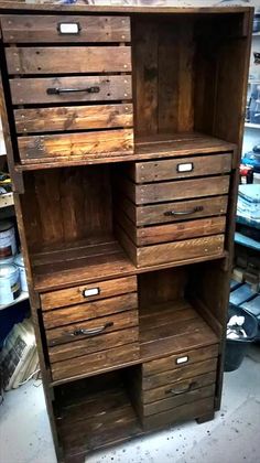 an old wooden cabinet with drawers in it