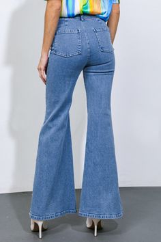 A pair of denim pants, washed to perfection, with a front closure and multiple pockets, and a flattering flare leg finished with trendy fray detailing.Details:Self : 80% Cotton 20% PolyesterSize & Fit- Model is 5`10" And Wearing Size Small- Measurements Taken From Size Small- Approx. Length: 44" High-rise Medium Wash Flares With Five Pockets, Denim Flares With Five Pockets, Dark Wash Flare Denim Jeans, Dark Wash Denim Flare Jeans, High Waist Medium Wash Flare Jeans With Frayed Hem, High Waist Medium Wash Flares With Five Pockets, Medium Wash High-waist Flares With Five Pockets, Trendy Medium Wash Flares With Five Pockets, Trendy Cotton Flares With Frayed Hem