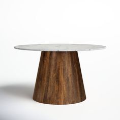 a white marble topped table with wooden base