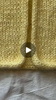 a video demonstrating how to knit the back side of a sweater