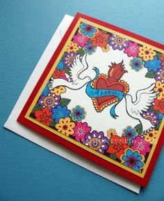 a card with an image of a bird and flowers on it