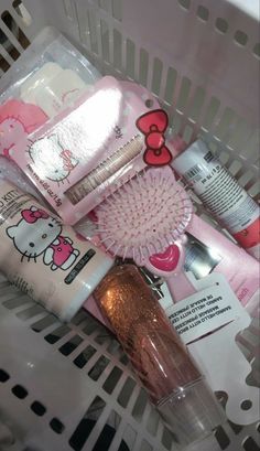 a basket filled with lots of different types of beauty products in it's packaging