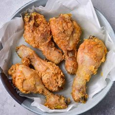 fried chicken wings in a bowl on a table