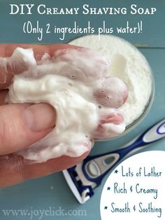 a hand holding a creamy shaving soap in front of a bowl of powdered sugar