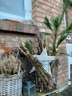 a basket filled with lots of branches next to a building