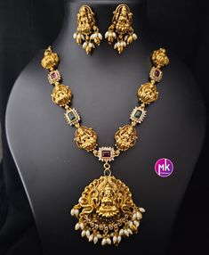 Lakshmi Premium quality Matte gold finish Necklace with Earrings - Traditional Necklace - Temple Jewelry - MK Fashionkart Earrings: Matching Earrings Material: Matte gold finish, AD Stones Suitable for Saree/Salwar/party wear dresses Adjustable length    SHIPPING : Ready to ship in 1 business day. This item will be shipped from The United States. Jewelry care instructions : 1. Please wipe the jewelry with a piece of cotton cloth after usage.  2. Store the jewelry in a cool, dry and air tight box or pouch.  3. Make sure the jewelry is away from direct heat and water. 4. Please wipe of any moisture, sweat, soap water after usage. Laxmi Pendant Gold Temple Jewellery, Salwar Party Wear, Temple Jewelry Necklace, Traditional Necklace, Gold Temple Jewellery, Earrings Matching, Temple Jewelry, Gold Chain Design, Thanks For The Gift