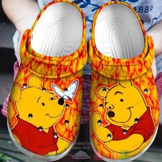 a pair of winnie the pooh shoes is shown